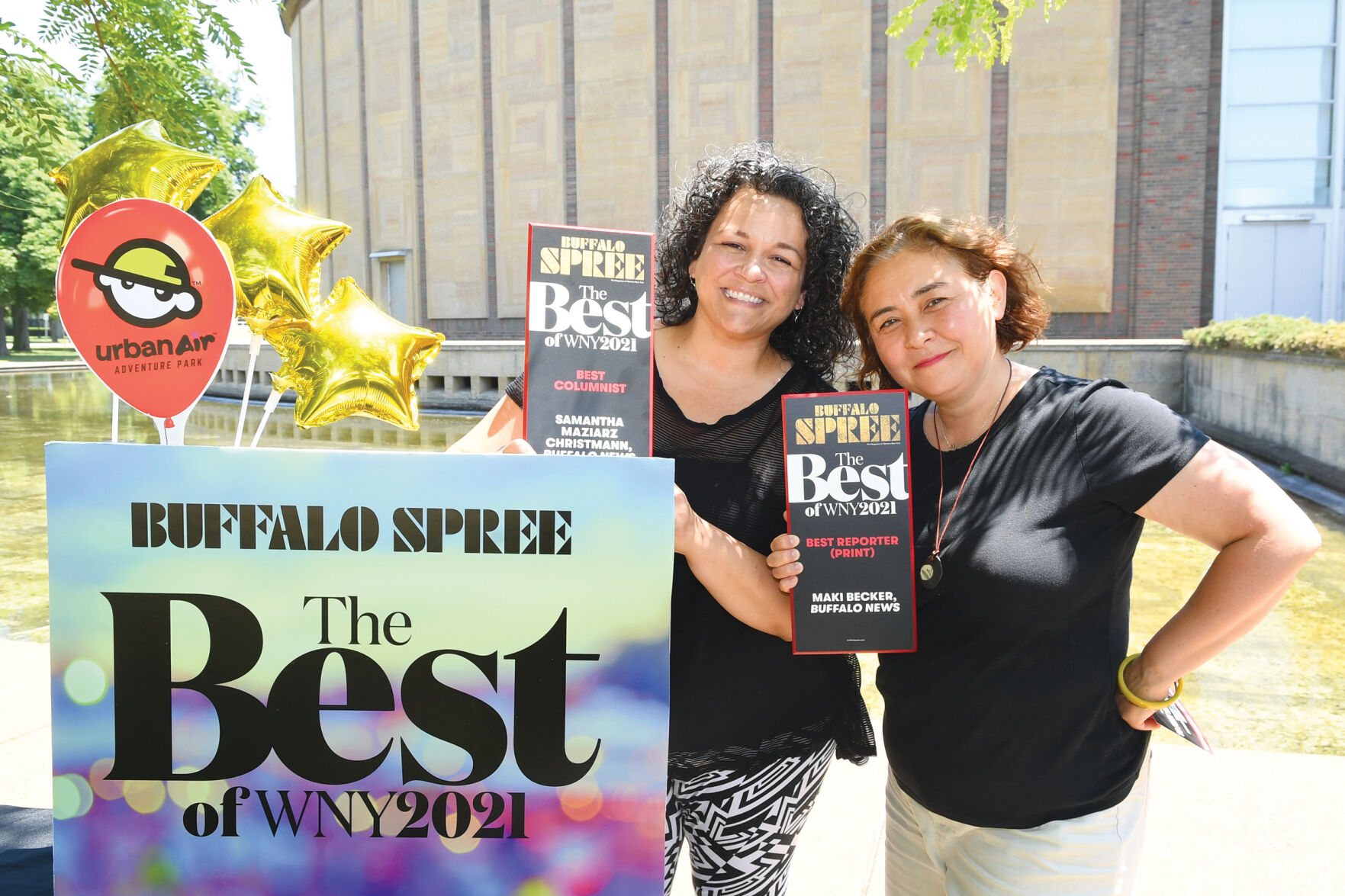 Samantha Christmann, Best Columnist and Maki Becker, Best Reporter, both from Buffalo News